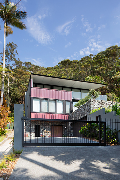 External view of the building, black bushfire safe windows
