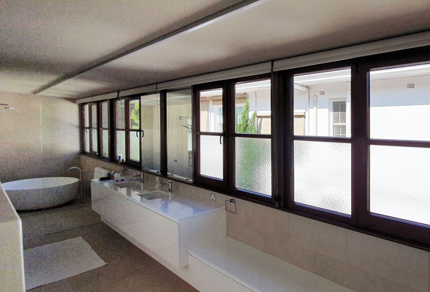 Jewel Box - Heritage windows, opening as tilt & turn, partly frosted for privacy