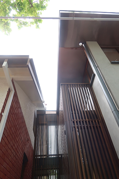 Jewel Box - link to extension, fixed glazing with timber battens