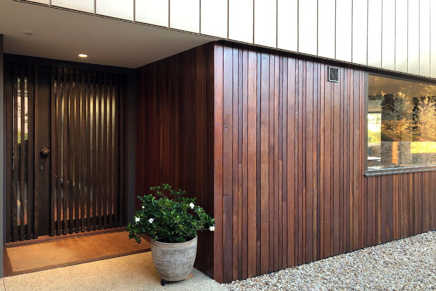 Entrance door with battens